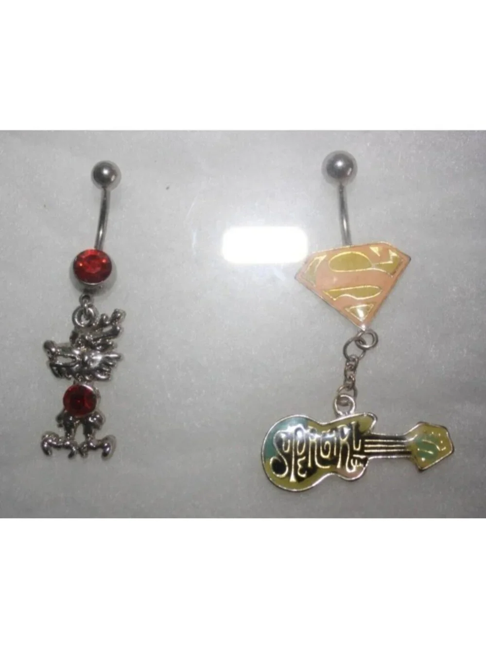 Dragon & Super Girl Belly Rings Set (2) Stainless Steel Red Pink Guitar NWT